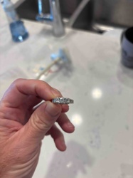 Three-Stone Diamond Ring with Channel-Set Accents