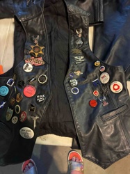 Personalized Black Leather Motorcycle Vest with Pins and Patches