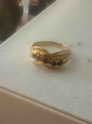 Gold Tone Ring with Dark Gemstone Accents