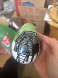 Decorative Ceramic Egg with Rustic Building Design