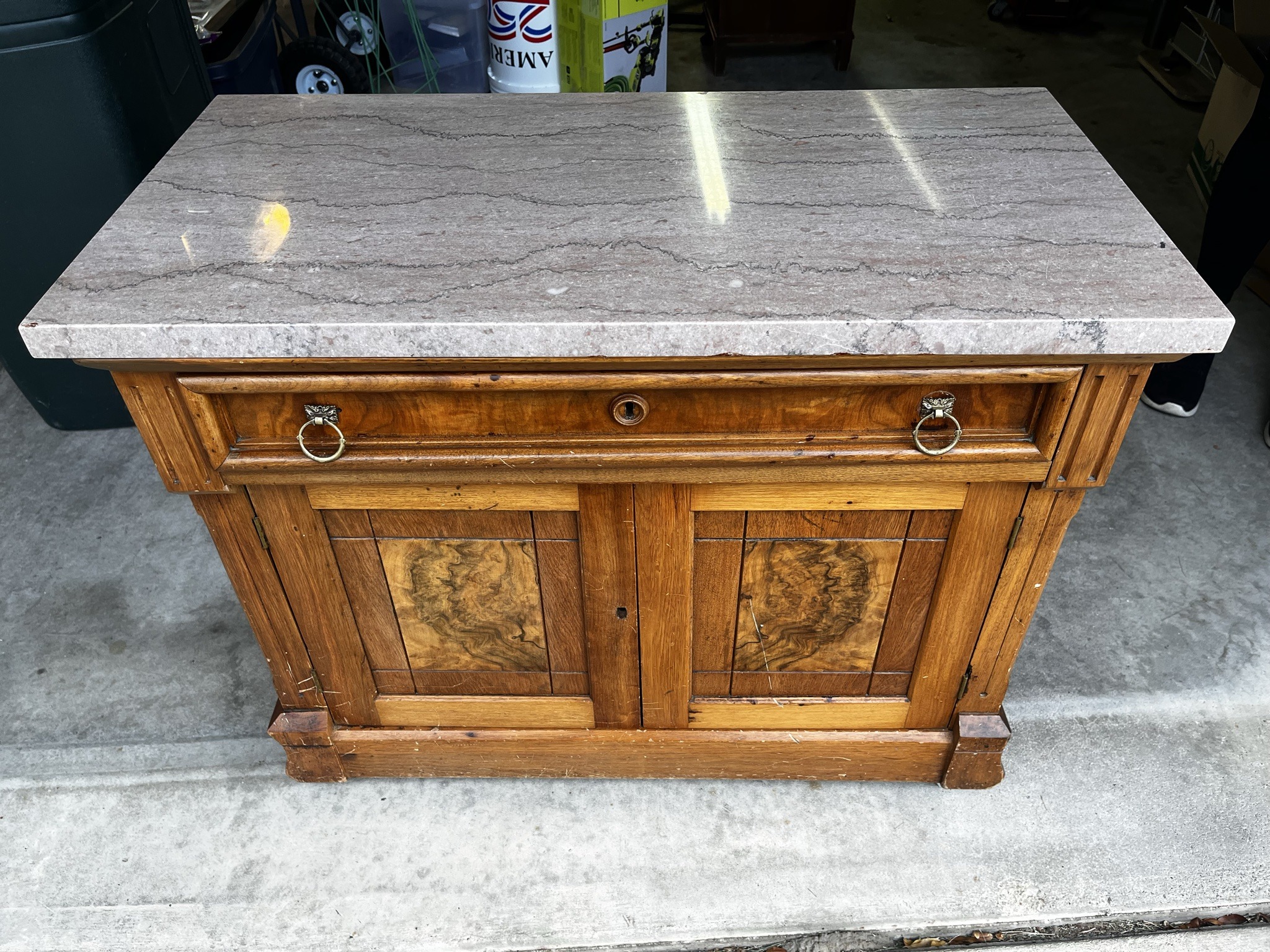 Submitted photo of Marble top wooden cabinet