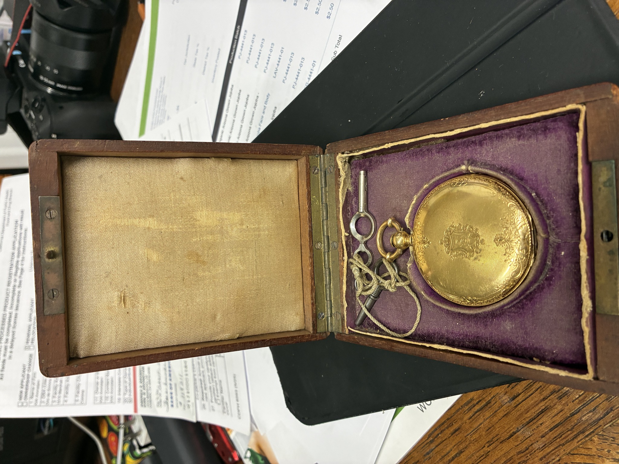 Submitted photo of Gold-tone pocket watch in presentation box (not authenticated)
