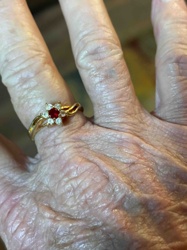 Gold Ring with Ruby-like Center Stone and Diamond Accents