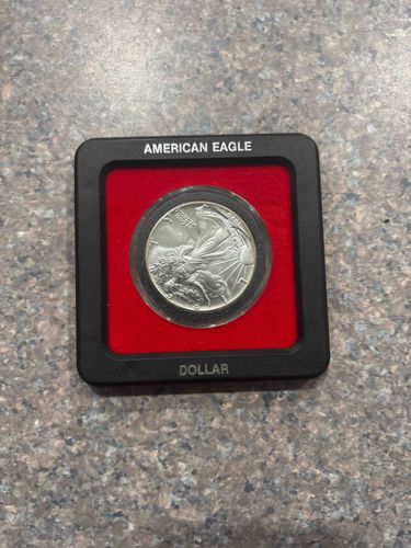 American Silver Eagle Dollar Coin in Display Case