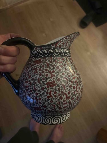 Hand-Painted Ceramic Pitcher with Floral and Scroll Motifs