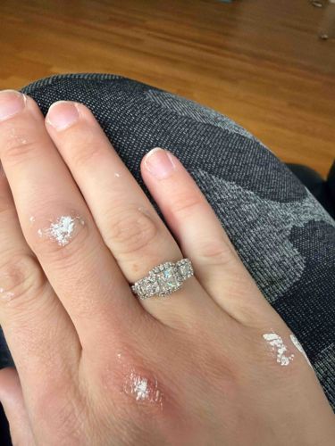 Three-Stone Diamond Ring with Pavé Setting