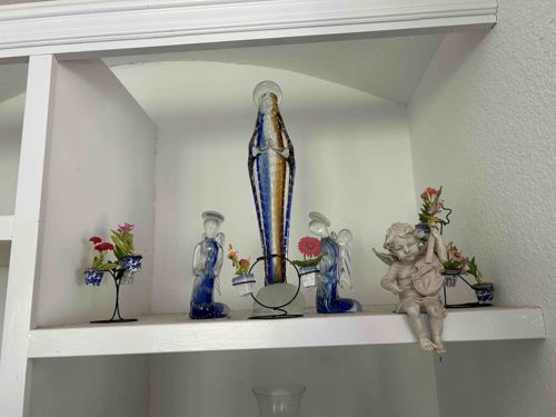 Collection of Religious and Cherub Figurines with Floral Accents