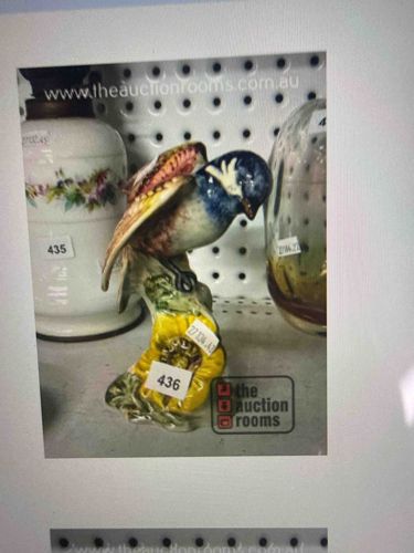 Glazed Ceramic Bird Figurine on Floral Base