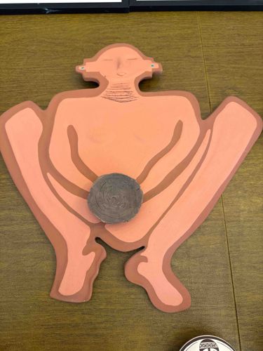 Stylized Squatting Figure Folk Art Sculpture