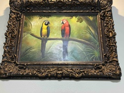 Painting of Two Macaws on a Branch in an Ornate Frame