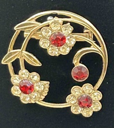 Gold-Tone Floral Motif Brooch with Red and Clear Rhinestones