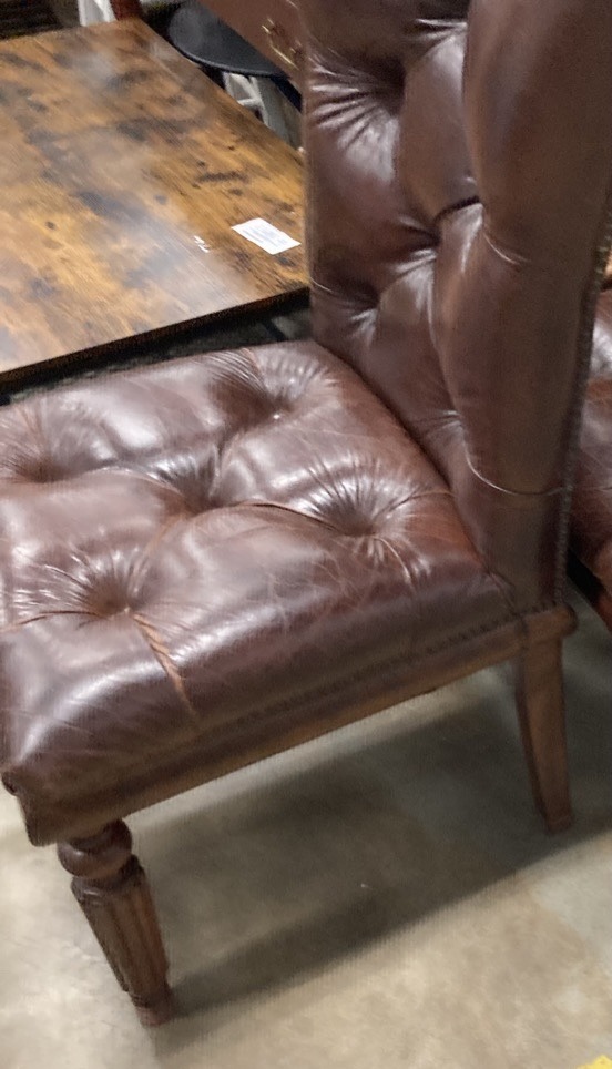 Submitted photo of Chesterfield-style tufted leather slipper chair