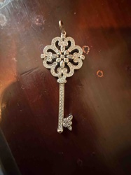 Tiffany & Co.'s Fleur de Lis Diamond Key Pendant