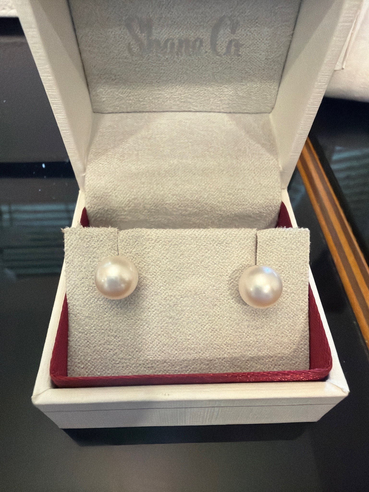 Submitted photo of Pearl Stud Earrings, bears a box marked 'Shane Co.' (not authenticated)