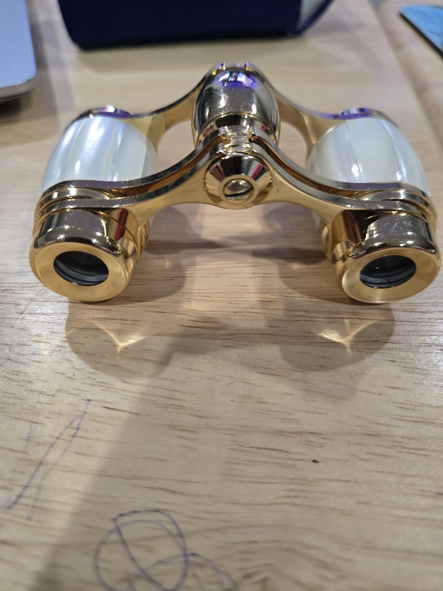 Submitted photo of Mother-of-pearl and gilt opera glasses (unverified maker)