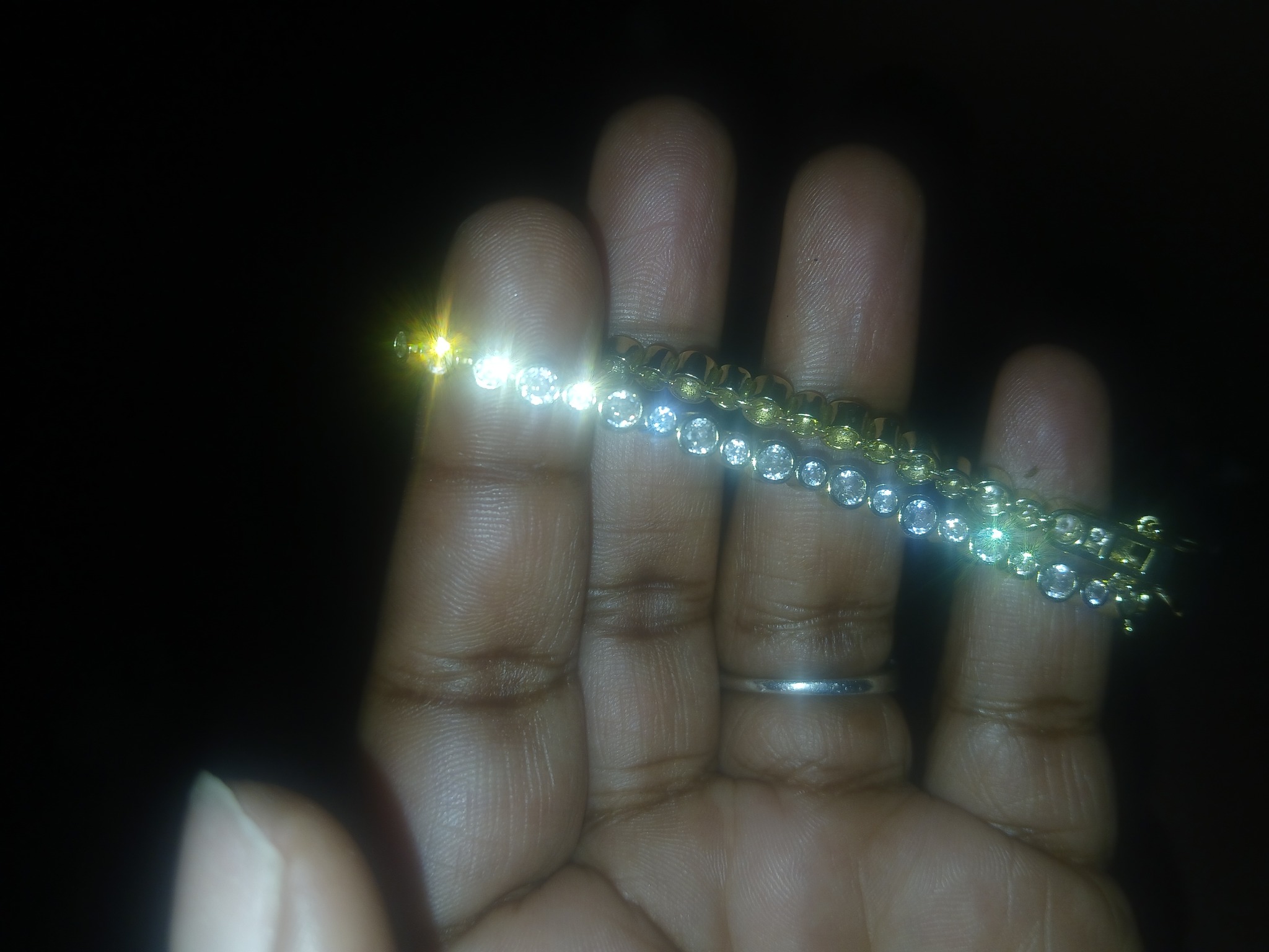 Submitted photo of Gold-tone round stone tennis bracelet