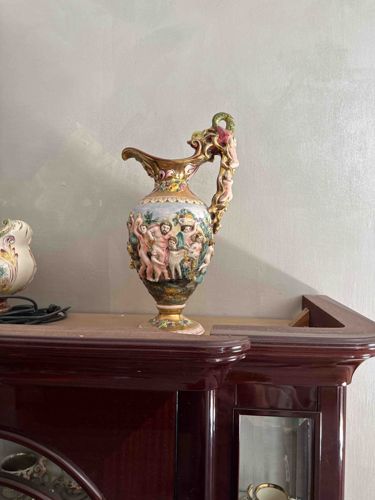 Ornate Ceramic Pitcher (Ewer) with Putti Decoration