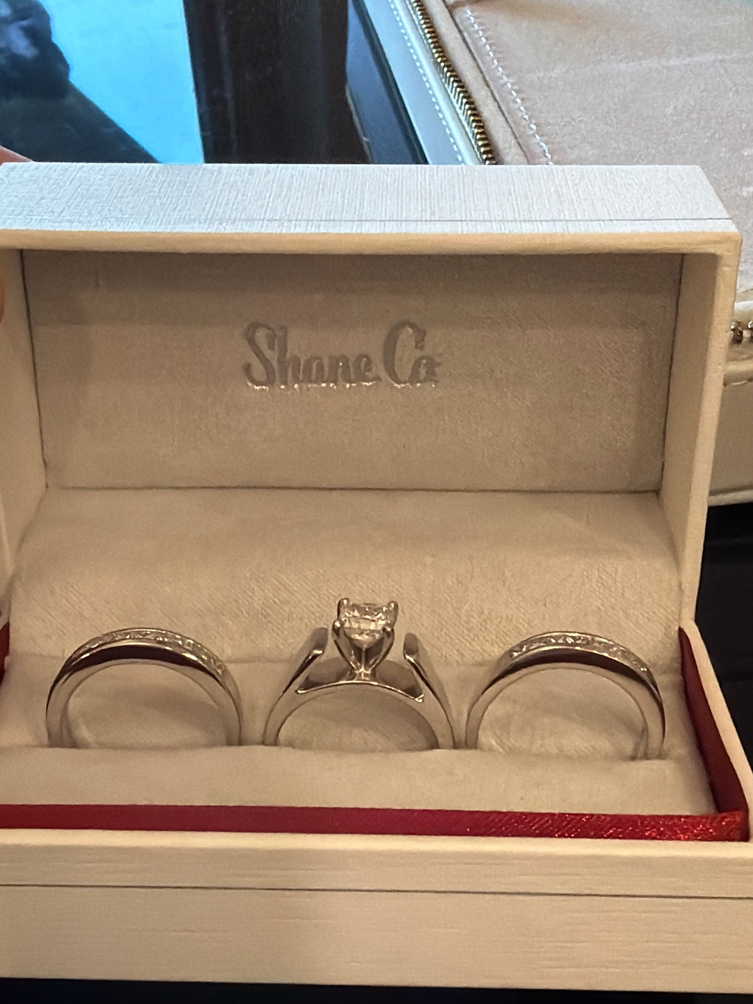 Submitted photo of Diamond bridal ring set in presentation box bearing a logo reading 'Shane Co.' (not authenticated)