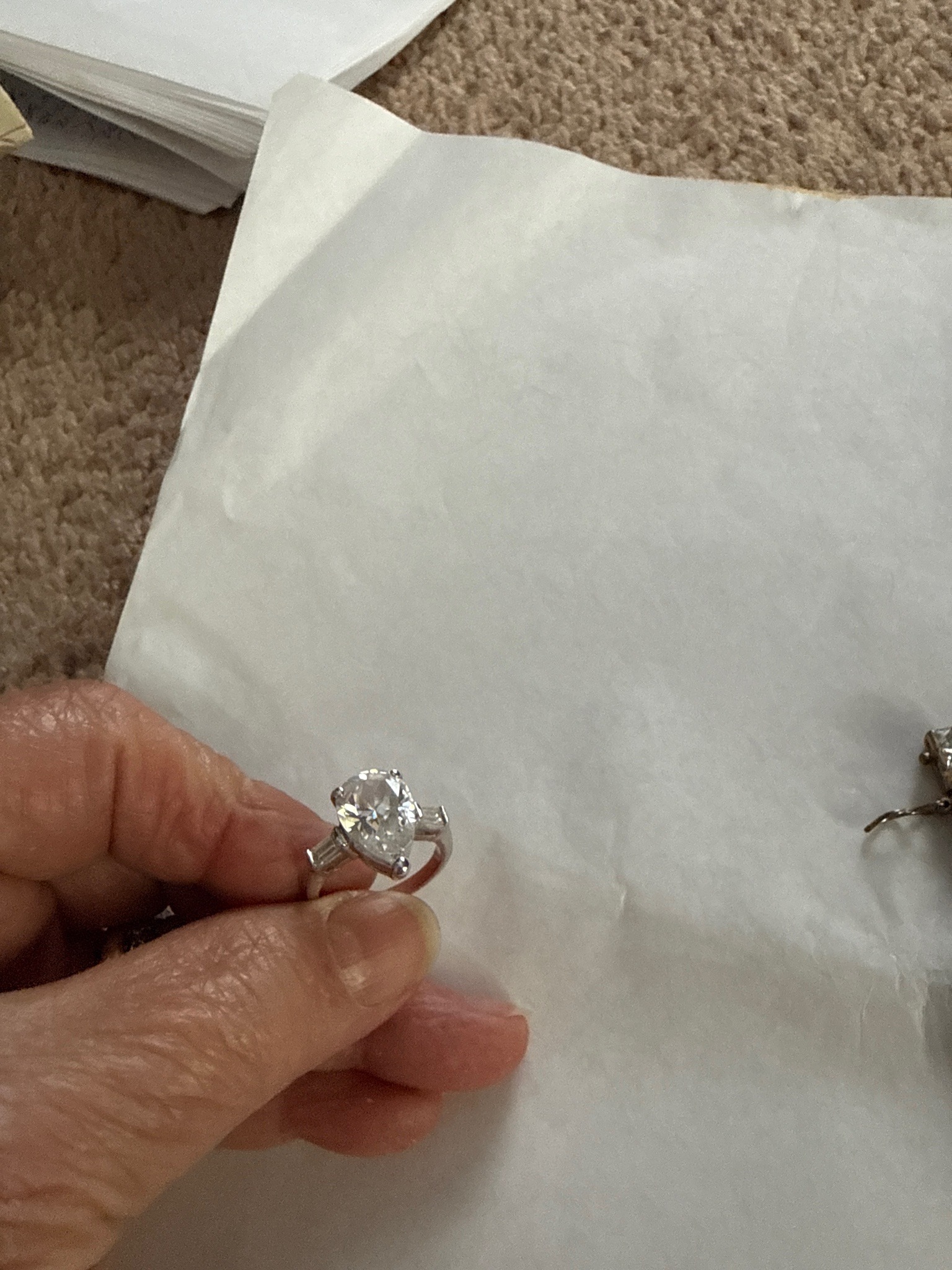 Submitted photo of Diamond three-stone ring (unauthenticated)