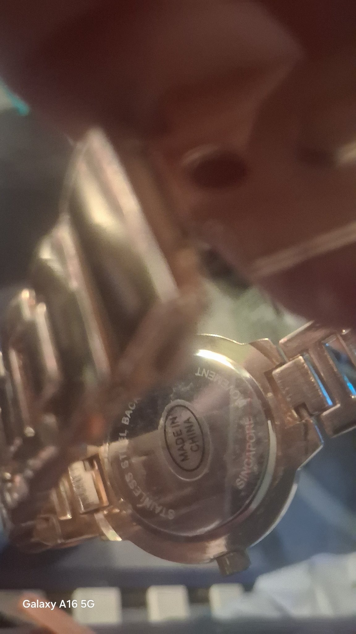 Submitted photo of Gold-tone metal wristwatch with metal link bracelet