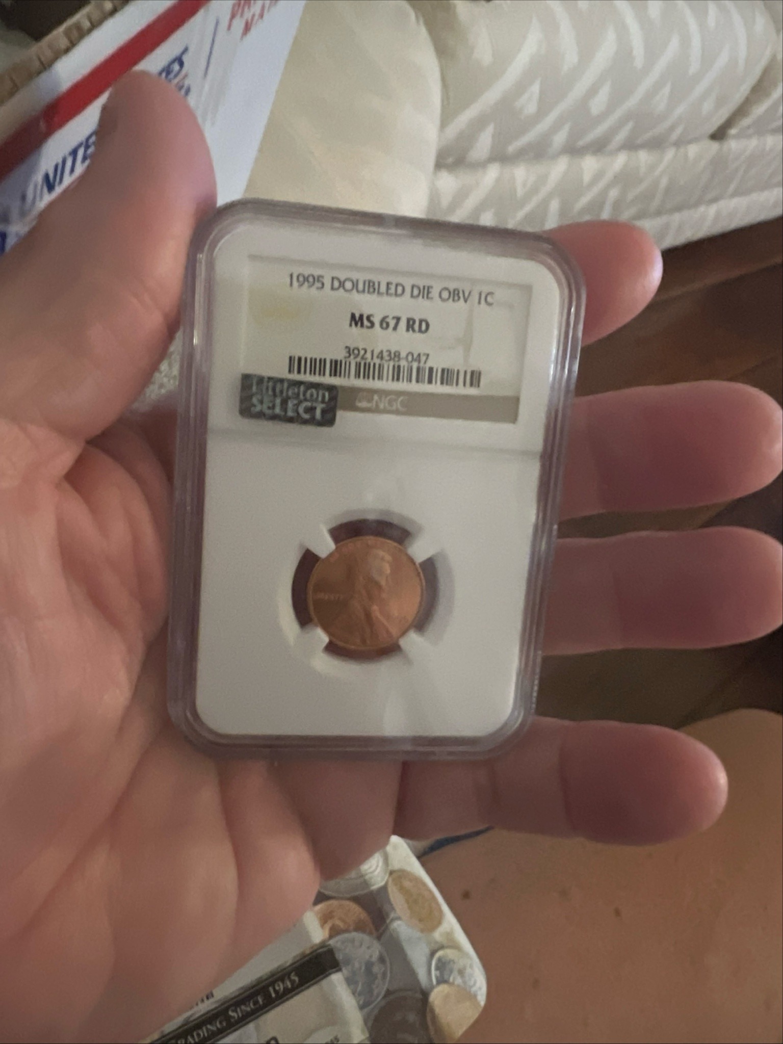 Submitted photo of 1995 Doubled Die Obverse Lincoln Cent, MS 67 RD (unauthenticated slab)
