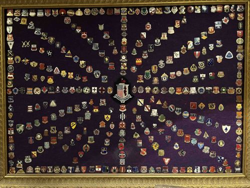 Framed Collection of Military Unit Insignia Pins