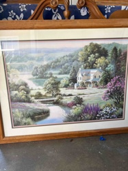Framed Landscape Print depicting a Stone House by a River