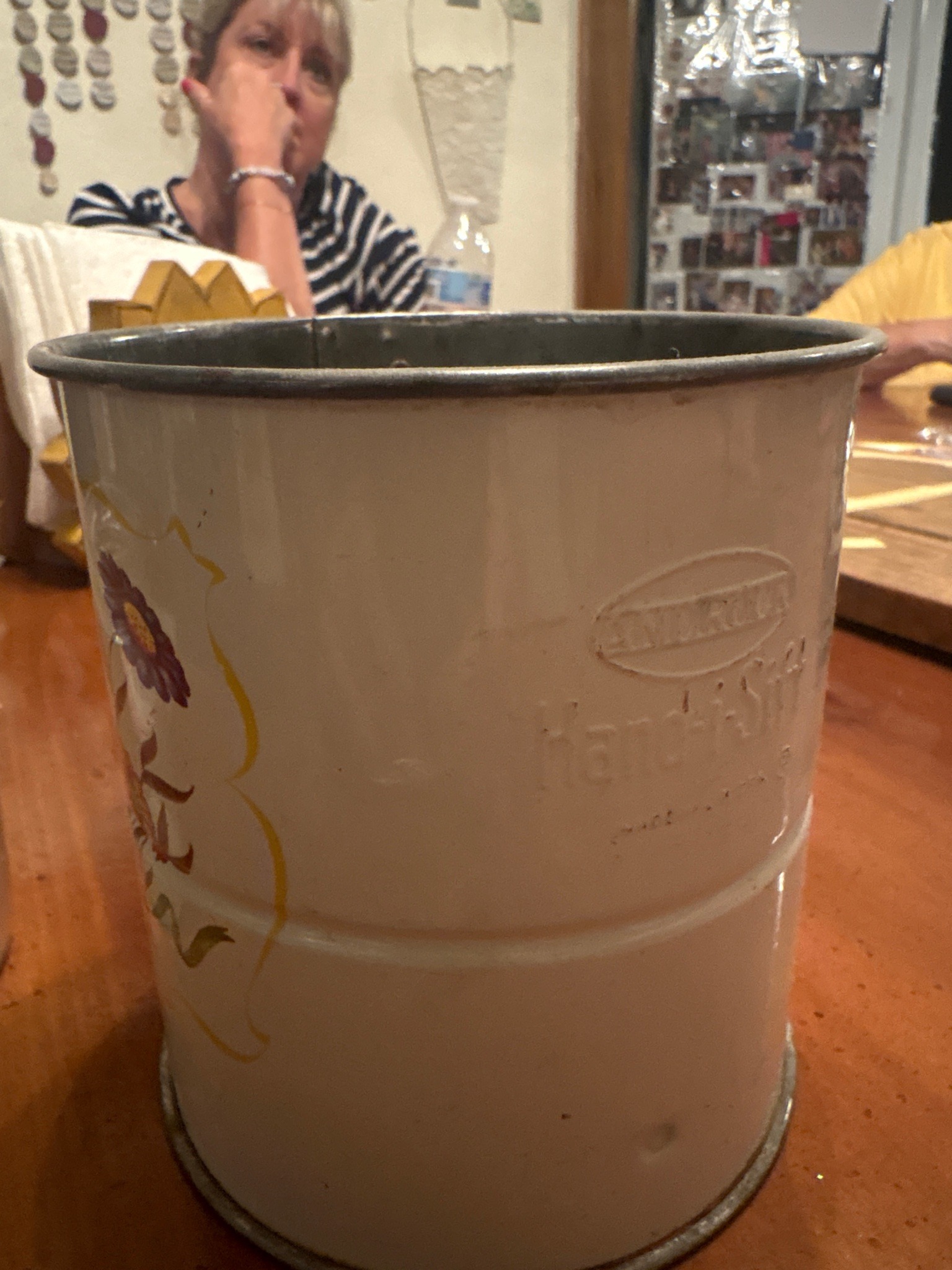 Submitted photo of Metal waste basket bearing embossed text 'Hand-i-Sifter' (not authenticated)