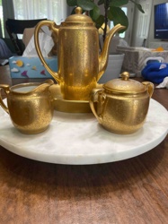 Gold-Finished Tea Set (Pot, Creamer, Sugar Bowl, and Tray)