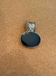 Oval Black Cabochon Pendant with Ornate Silver-Tone Bail
