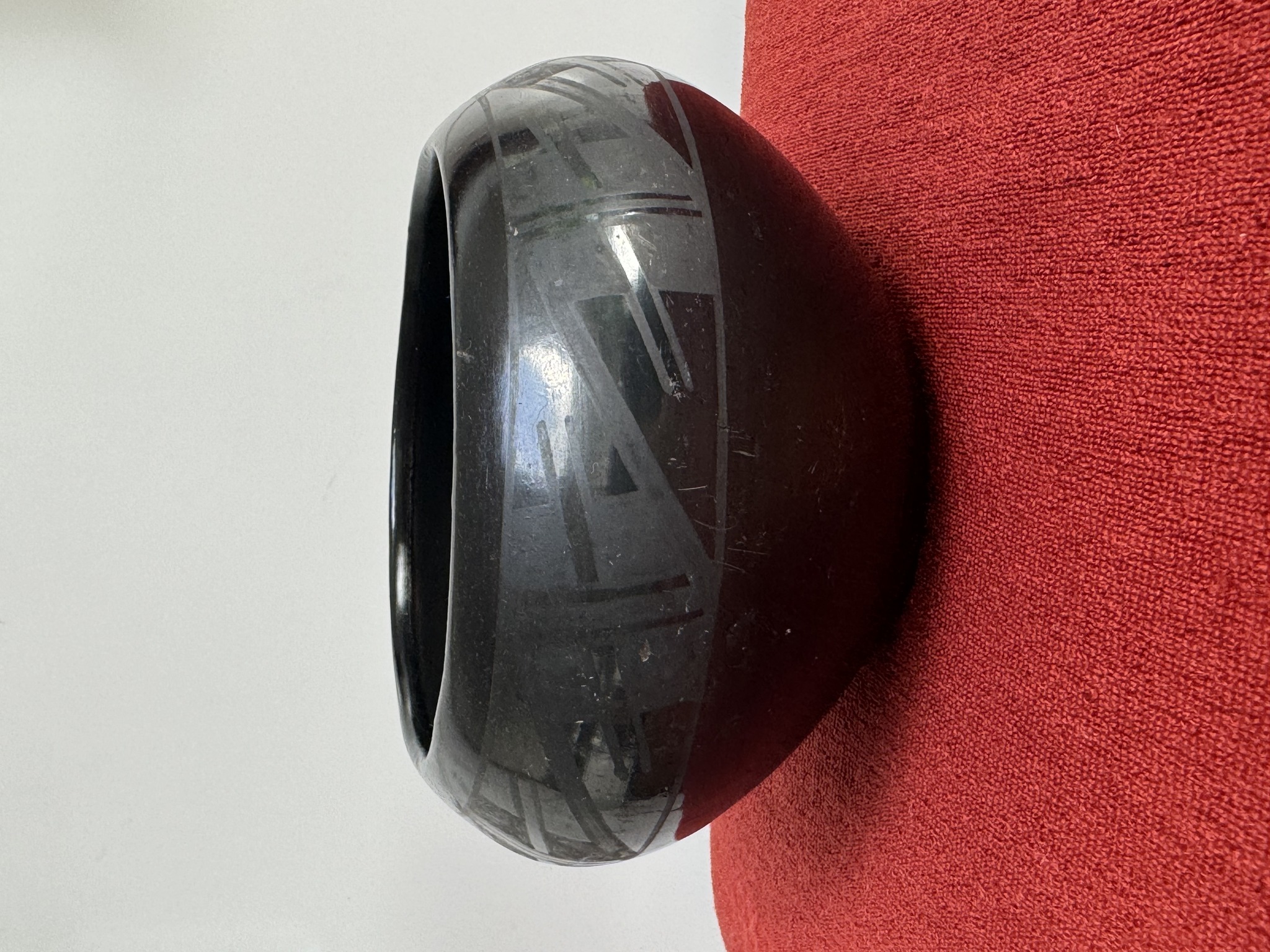 Submitted photo of Black-on-black pottery vessel, attributed to Marie Martinez (not authenticated)