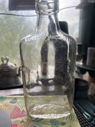 Half Pint Clear Glass Bottle with State of Minnesota Embossing