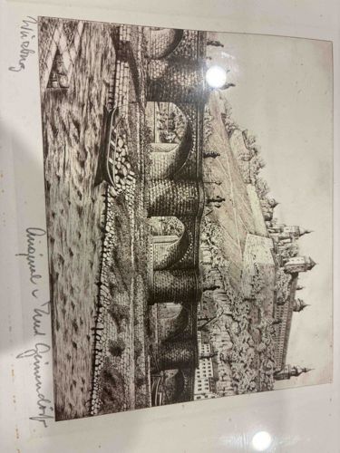 Pen and Ink Drawing of a European Cityscape with a Bridge and River