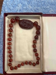 Carved Brown Resin (possibly Bakelite or Amberoid) Bead Necklace with Central Carved Plaque