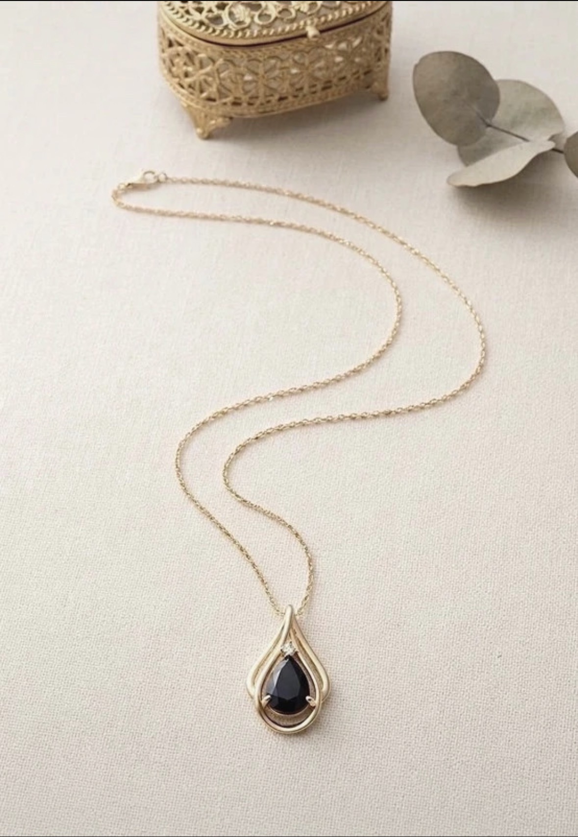 Submitted photo of Gold-tone teardrop pendant necklace