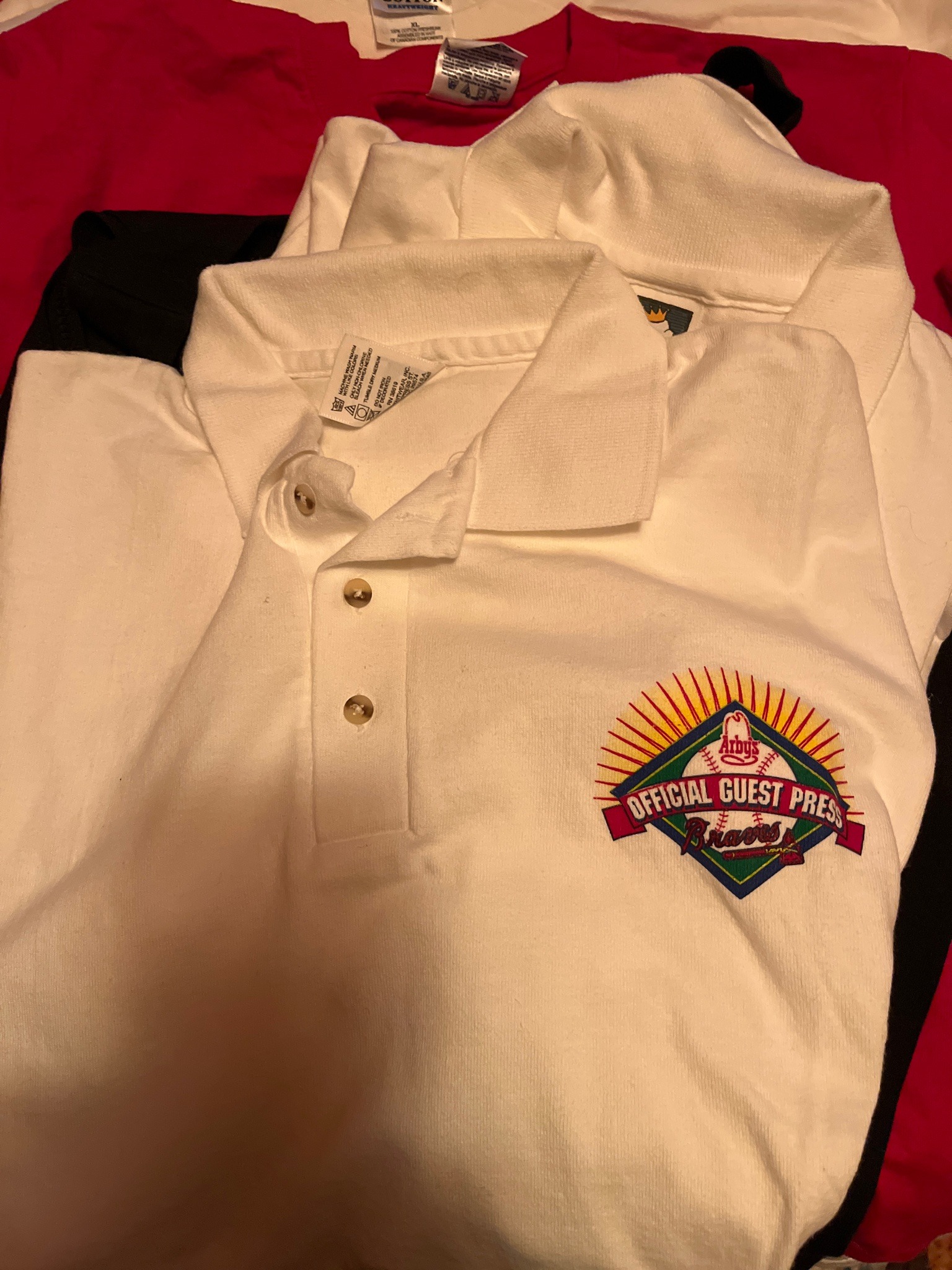 Submitted photo of Arby's Official Guest Press Atlanta Braves polo shirt (not authenticated)