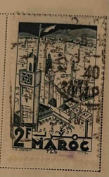 Moroccan Postage Stamp '2F Maroc Fes' featuring Cityscape with Clock Tower