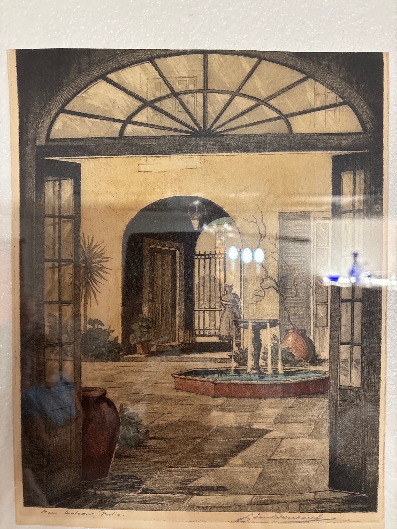 Submitted photo of Etching depicting a New Orleans patio signed 'Leon Pescheret'