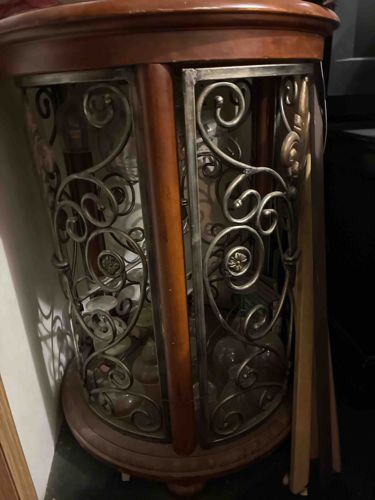 Ornately Decorated Curio Cabinet