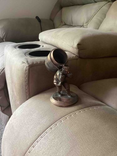 Figural Man Carrying Barrel Sculpture with Holder