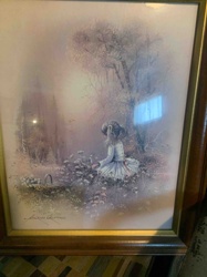 Framed Print: Girl Picking Flowers in a Misty Woodland