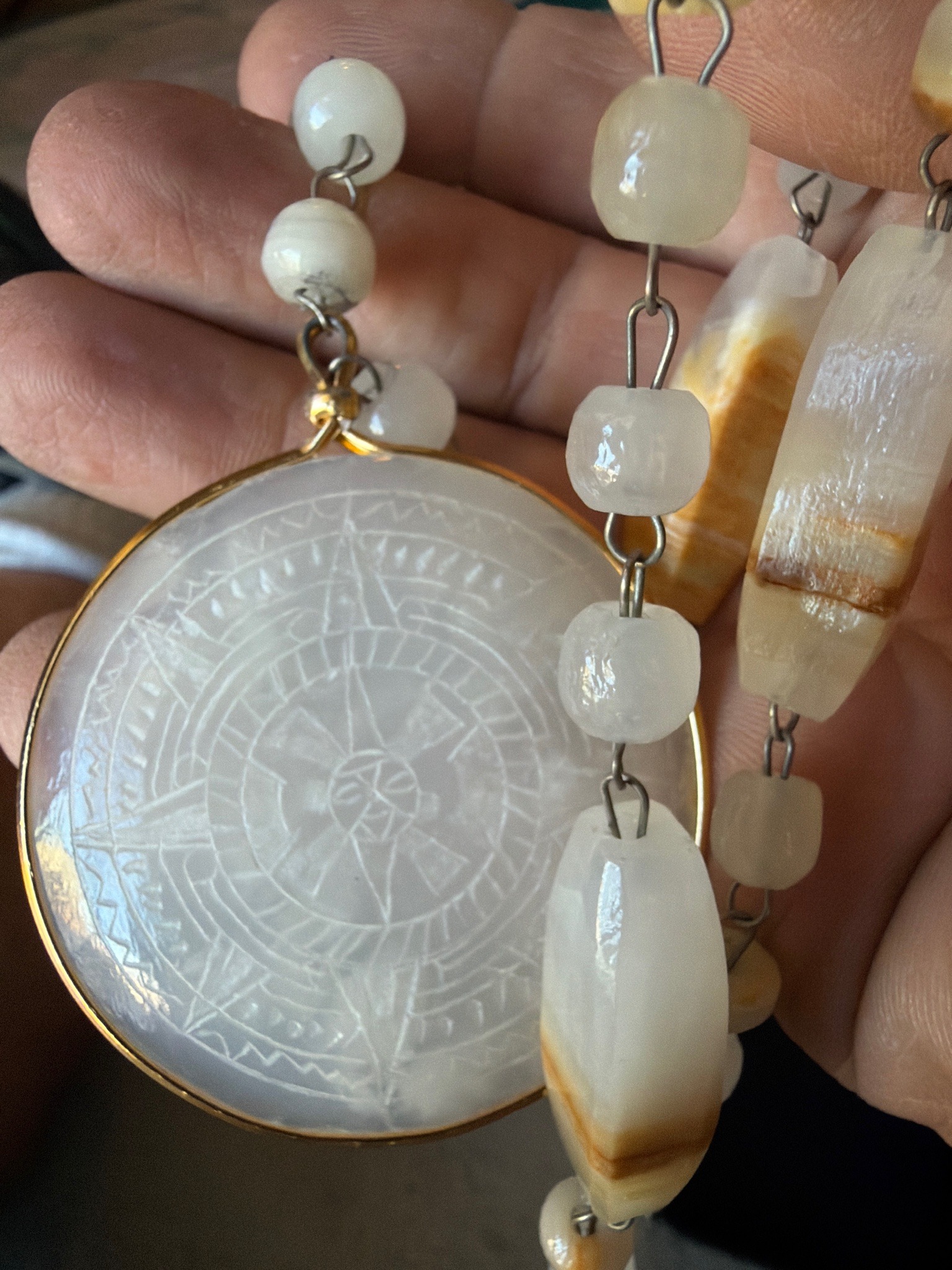 Submitted photo of Carved Quartz or Agate Pendant Necklace in a Pre-Columbian Style
