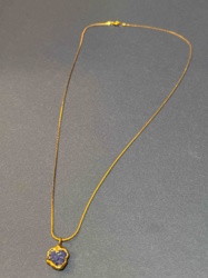 Gold-Toned Necklace with Irregular Blue Stone Pendant