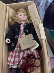 Porcelain Doll with Plaid Dress and Knitted Cardigan