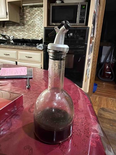 Clear Glass Cruet with Metal Weighted Pourer