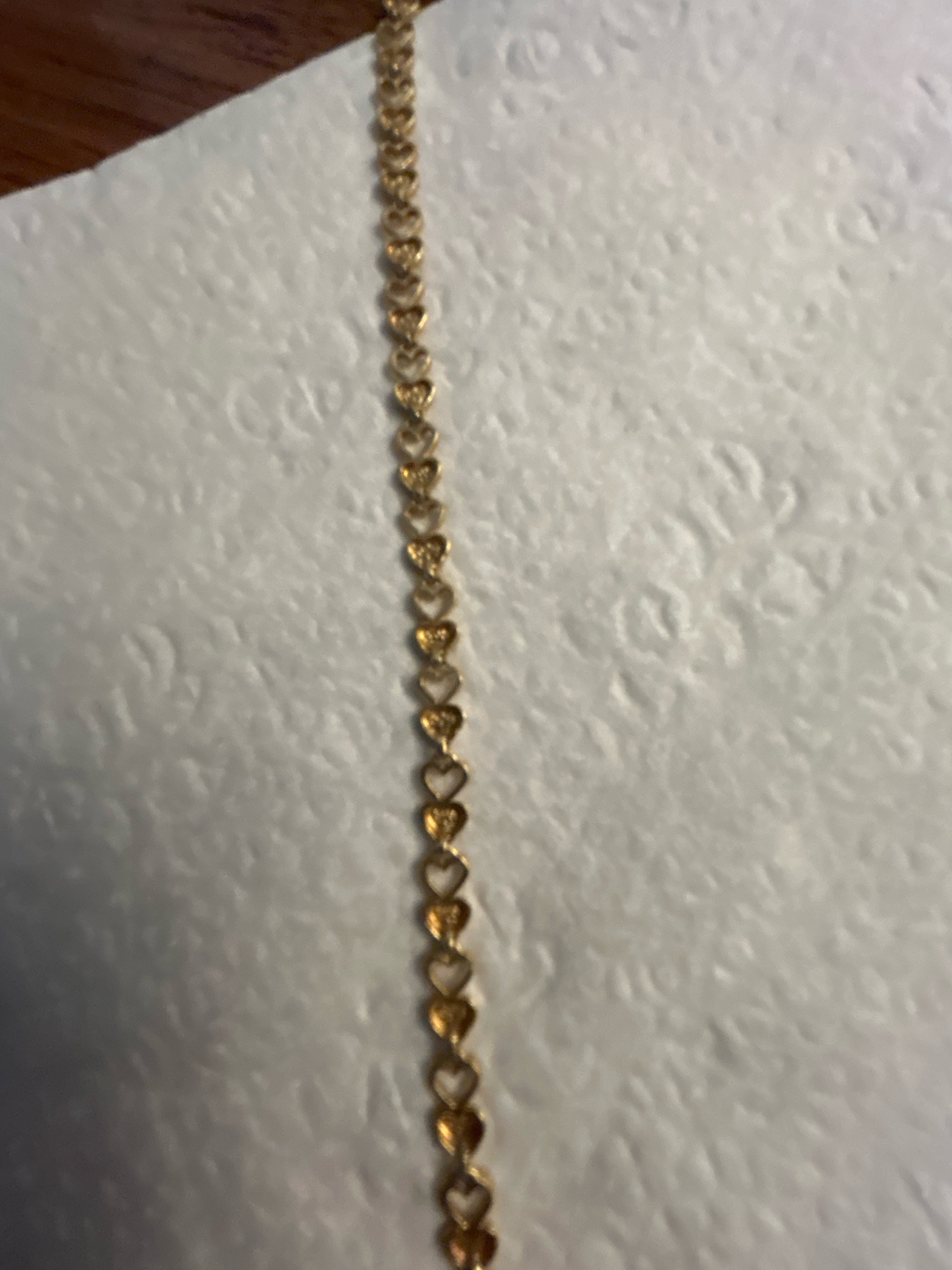 Submitted photo of Gold-tone heart link tennis bracelet