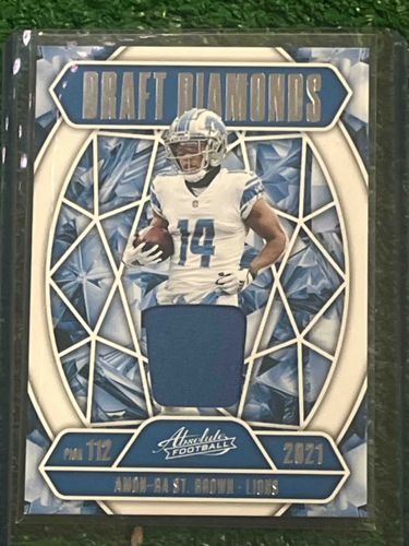 2021 Panini Absolute Football Amon-Ra St. Brown Draft Diamonds Rookie Memorabilia Card