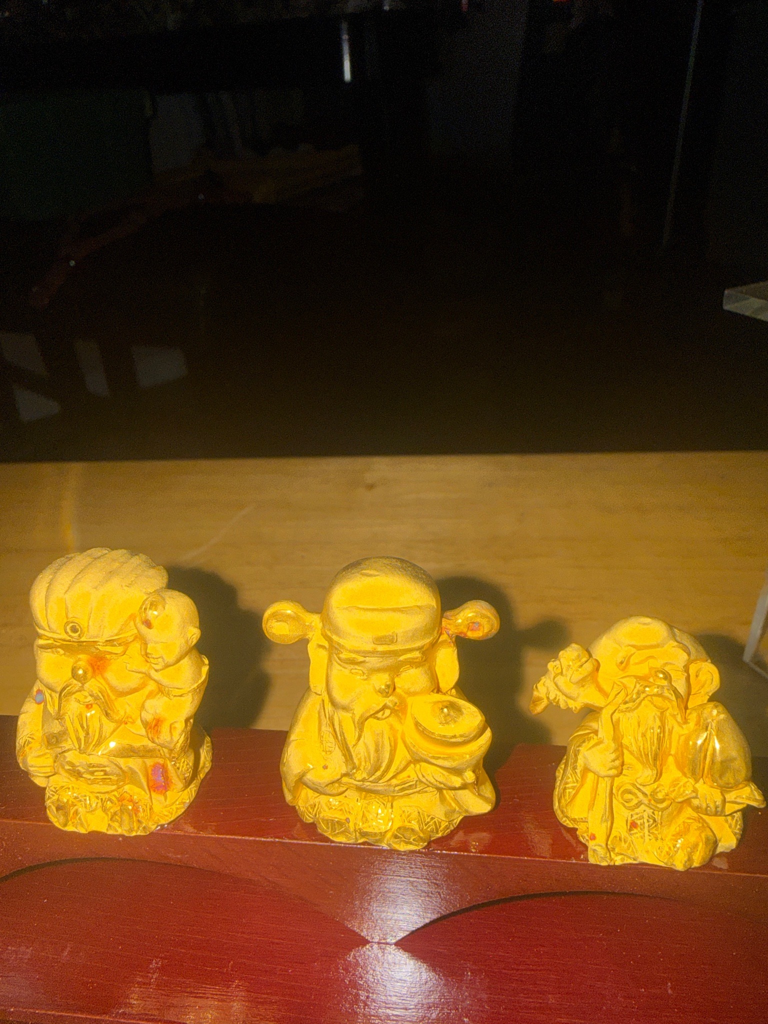 Submitted photo of Gilded resin figurines depicting the Three Star Gods (Fu Lu Shou)