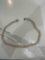 Single Strand Pearl Necklace with Decorative Clasp