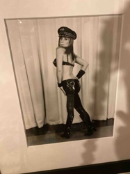 Black and White Photograph of a Woman in Provocative Attire